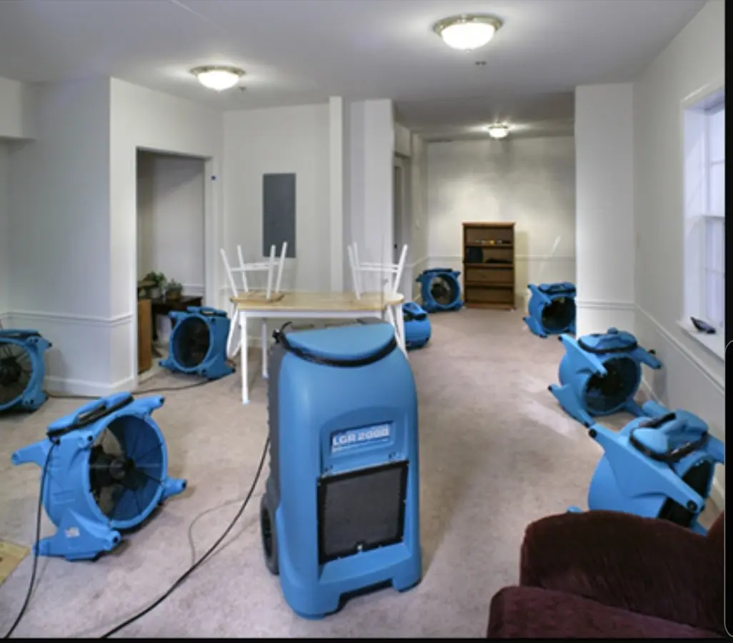 Air movers and dehumidifier setup for Water Extraction & Removal in Warr Acres